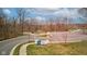 Scenic entrance to Westfield Freedom Trail Park features ample parking, signage, and beautiful natural surroundings at 528 Wind Skip Cir, Westfield, IN 46074
