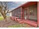 Exterior view of a screened-in porch with natural light, offering an outdoor living space at 528 Wind Skip Cir, Westfield, IN 46074