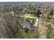 Stunning aerial view of the home showcasing the lush surroundings and architectural details at 552 E 82Nd St, Indianapolis, IN 46240