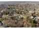 Panoramic aerial view of a charming residential area with lush greenery and well-maintained homes at 552 E 82Nd St, Indianapolis, IN 46240