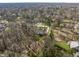 Expansive aerial view of a charming neighborhood with tree-lined streets and beautiful homes at 552 E 82Nd St, Indianapolis, IN 46240