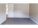 This bedroom has neutral colored walls and plush carpeting at 5786 Blue Sky Dr, Whitestown, IN 46075