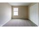 This bedroom has a window for natural light and a standard closet at 5786 Blue Sky Dr, Whitestown, IN 46075