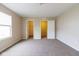 Spacious bedroom with neutral walls, carpet flooring, and a window that provides bright natural light at 5786 Blue Sky Dr, Whitestown, IN 46075