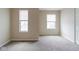 Bedroom featuring carpet flooring and a window, offering a cozy and inviting space at 5786 Blue Sky Dr, Whitestown, IN 46075