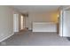 Upstairs loft area features neutral walls and carpet throughout at 5786 Blue Sky Dr, Whitestown, IN 46075