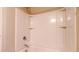 Close-up of a clean shower-tub combination with white surround and sleek fixtures at 5786 Blue Sky Dr, Whitestown, IN 46075