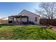 Backyard features a pergola with an outdoor seating area for relaxing and entertaining at 5846 Edgewood Trace Blvd, Indianapolis, IN 46239