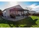 Backyard features a pergola with an outdoor seating area for relaxing and entertaining at 5846 Edgewood Trace Blvd, Indianapolis, IN 46239