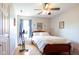 Bedroom featuring natural light and a ceiling fan plus hardwood flooring at 5846 Edgewood Trace Blvd, Indianapolis, IN 46239