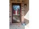 The inviting front door features an American flag decoration and a charming welcome statue on the porch at 5846 Edgewood Trace Blvd, Indianapolis, IN 46239
