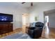 Inviting living room with hardwood floors, comfortable seating, and neutral tones for a relaxing atmosphere at 5846 Edgewood Trace Blvd, Indianapolis, IN 46239