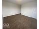 This bedroom features neutral walls, carpet, and one door at 639 Rocky Meadow Dr, Greenwood, IN 46143