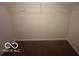 A walk-in closet with carpet and a metal shelf at 639 Rocky Meadow Dr, Greenwood, IN 46143