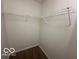 Walk in closet with wire shelves and carpet at 639 Rocky Meadow Dr, Greenwood, IN 46143