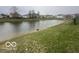 A beautiful pond is part of the community at 639 Rocky Meadow Dr, Greenwood, IN 46143