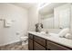 Bathroom with a single sink vanity, featuring a marble countertop, toilet, and shower at 647 Albermarle Dr, Pittsboro, IN 46167