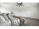Large main bedroom with tray ceiling and neutral decor at 647 Albermarle Dr, Pittsboro, IN 46167