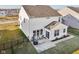 Spacious backyard with patio, perfect for outdoor entertaining and relaxation and featuring a fenced perimeter at 6630 Overlander Ln, Whitestown, IN 46075