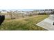 Expansive backyard with a fence, offering privacy and scenic views of the pond with a fountain at 6630 Overlander Ln, Whitestown, IN 46075