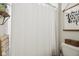 Full bathroom with a white shower curtain, a decorative shelf, and stylish wall art at 6630 Overlander Ln, Whitestown, IN 46075
