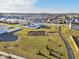 Aerial view of a neighborhood park with a playground and walking path surrounded by Gathering homes at 6630 Overlander Ln, Whitestown, IN 46075