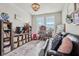 Bright playroom featuring toys and a large couch for to enjoy at 6630 Overlander Ln, Whitestown, IN 46075