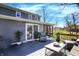 Beautiful back deck with sliding glass door and open patio seating area at 6820 W Forest Brook Dr, Fountaintown, IN 46130