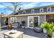 Backyard deck with outdoor seating and a sliding glass door that provides inside access at 6820 W Forest Brook Dr, Fountaintown, IN 46130