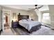 Spacious bedroom featuring a king-size bed, stylish nightstands, and a calming atmosphere at 6820 W Forest Brook Dr, Fountaintown, IN 46130