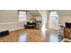 Spacious bonus room with natural light, hardwood floors and neutral paint at 6820 W Forest Brook Dr, Fountaintown, IN 46130