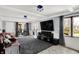 Comfortable living room featuring a large TV and stylish furnishings, perfect for relaxation and entertainment at 6820 W Forest Brook Dr, Fountaintown, IN 46130