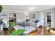 Spacious living room with hardwood floors, a comfortable couch, and an open floorplan at 6820 W Forest Brook Dr, Fountaintown, IN 46130