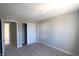 Neutral bedroom with carpet, white trim, and sliding door closet, ideal for comfortable living at 735 Locust Dr, Danville, IN 46122