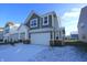 Charming two-story home with a two-car garage, covered porch and well maintained lawn at 735 Locust Dr, Danville, IN 46122