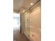 Modern shower stall featuring a glass door and tile flooring, perfect for a spa-like experience at 735 Locust Dr, Danville, IN 46122