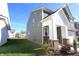 This charming home boasts a well-maintained lawn, gray siding, and classic white trim at 735 Locust Dr, Danville, IN 46122