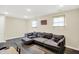 Spacious living room with an American flag and large sofa at 8315 San Marcos Cir, Indianapolis, IN 46256