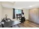 Comfortable office with a large desk, murphy bed and plenty of natural light at 8315 San Marcos Cir, Indianapolis, IN 46256