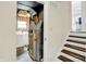 Utility room with a washer and dryer, as well as stairs at 8315 San Marcos Cir, Indianapolis, IN 46256