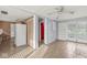 A dining area with bright light and open floorplan to the kitchen at 8606 Manderley Dr, Indianapolis, IN 46240
