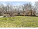 Charming ranch-style home with stone accents, a two-car garage, and a well-manicured lawn at 8606 Manderley Dr, Indianapolis, IN 46240