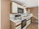 Functional kitchen featuring appliances and countertop space at 8606 Manderley Dr, Indianapolis, IN 46240