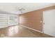 Bright room featuring sliding glass doors and a classic ceiling fan at 8606 Manderley Dr, Indianapolis, IN 46240