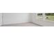 Light-filled room with neutral carpet, white walls, and natural light from two windows creating a calm space at 8730 Hollander Dr, Camby, IN 46113