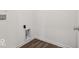 This utility room has a modern wood plank floor at 8730 Hollander Dr, Camby, IN 46113