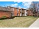 Attractive two-story home with a manicured lawn and established landscaping at 8920 Hunters Creek Dr # 101, Indianapolis, IN 46227