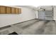 Spacious two-car garage with ample storage and an automatic door opener at 8920 Hunters Creek Dr # 101, Indianapolis, IN 46227