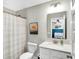 Bathroom featuring vanity, toilet, and a view into bedroom at 950 Edmonds Pl, Greenwood, IN 46143
