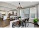 Inviting dining room with wood table, seating for six, and an elegant chandelier at 950 Edmonds Pl, Greenwood, IN 46143
